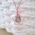 Collier avec pendentif étoile doré à l'Or rose et perle contenant vos mèches de cheveux