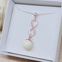 Collier avec pendentif infini & multistrass doré à l'Or rose et perle contenant votre lait maternel et/ou mèches de cheveux C47